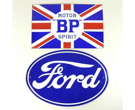 An oval Ford advertising sign, together with a BP sign (2)