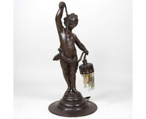 A bronzed cherub table lamp, 33cm high