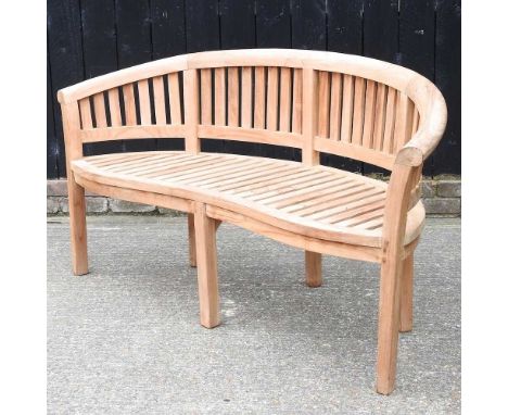 A teak garden bench, with a curved back159w x 55d x 84h cm