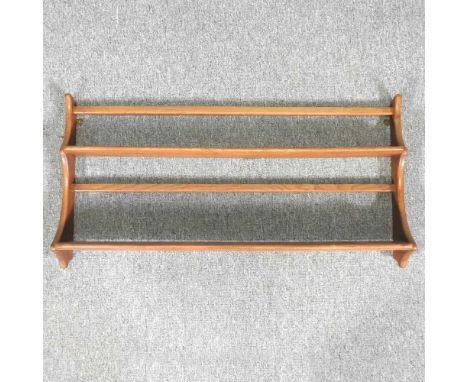 An Ercol two tier hanging wall shelf97w x 13d x 49h cm