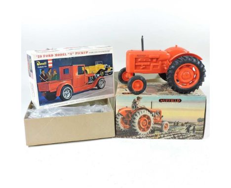 A Nuffield Universal Four scale model tractor, boxed, together with a Revell Ford Model A Pickup kit (2)