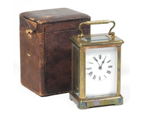 An early 20th century French brass cased carriage clock, 12cm high, in original caseWill wind and adjust ok, but not currentl