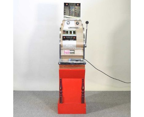 A 1960's Sega Starline Diamond Star fruit machine, on a painted wooden stand, 170cm high overallIt will turn on and light up.