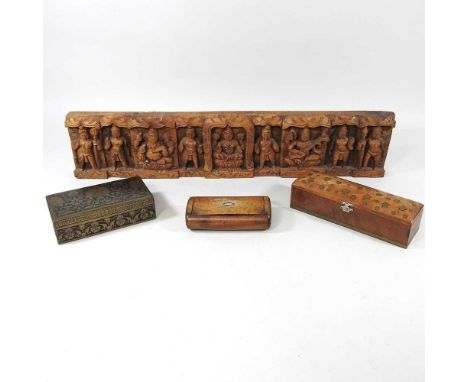 An Eastern Hindu Lakshmi carved hardwood panel. decorated with figures. 61cm wide, together with a 19th century burr yew snuf
