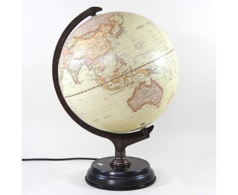 A modern student's light-up twelve inch globe, on a wooden base