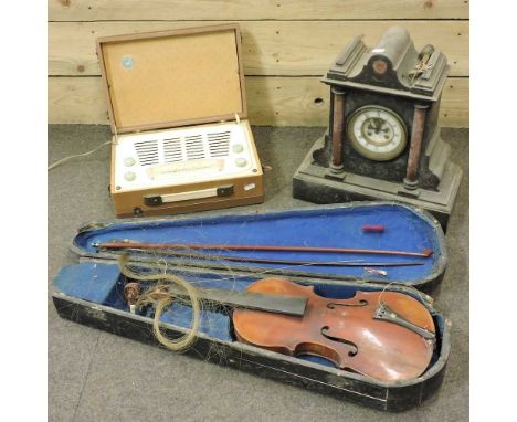 A Victorian black slate mantel clock, 40cm high, together with a Vintor vintage radio and a student's violin, cased (3)