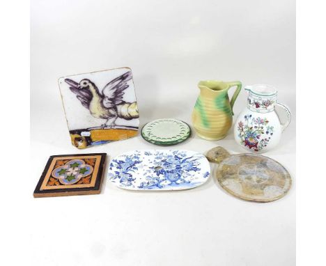 An Italian maiolica tile, together with a 19th century Staffordshire pottery meat drainer, 25cm wide and decorative china