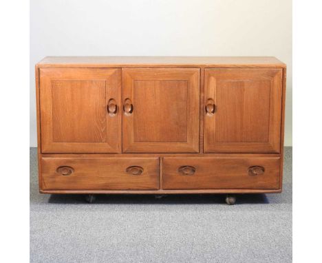 An Ercol Windsor light elm sideboard129w x 43d x 75h cm