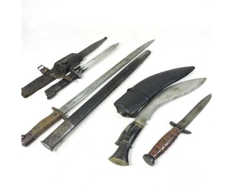 A bayonet, in scabbard, 57cm long, together with a US M-3 military dagger, a dagger in a leather sheath and a kukriAll are wo