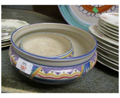 TWO POOLE POTTERY BOWLS BOTH WITH A GEOMETRIC DESIGN, PROBABLY BY TRUDA CARTER, LARGEST BOWL 23CM DIAM (HAIRLINE) (2) 