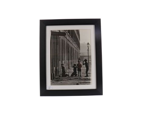 OSCAR MARZAROLI (1933-1988) PHOTOGRAPHIC PRINT, depicting children, mounted, framed and under glass, 53.5cm x 43.5cm overall