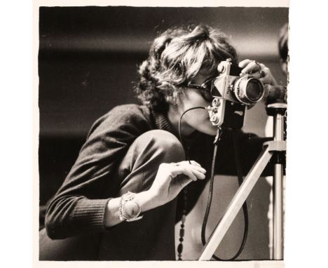 AR  * Moon (Sarah, b. 1941). [?Self-portrait of] Sarah Moon with her camera, [?]Paris, 1969, vintage gelatin silver print, im