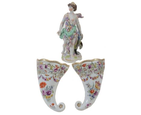 A pair of Dresden porcelain pierced wall pockets, circa 1900, 19.5cm high, 18th century style marks; and a modern porcelain m