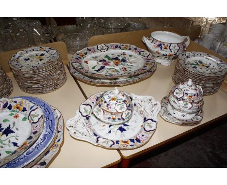 An Ironstrone part dinner service, to include tureens, meat dishes, plates, etc £70-100