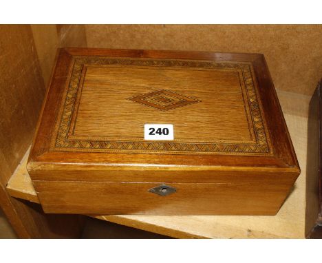 A selection of wooden items, to include an oak writing box, an inlaid games box (a/f) with a set of draughts, set of chessmen