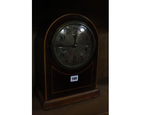 An Edwardian mahogany mantel clock by Sanders, Peckham, 34cm high, an oak barometer and another barometer (3) (AF) £60-80