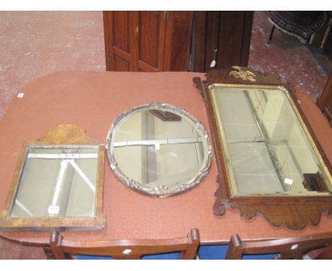 A fretwork mirror and two others