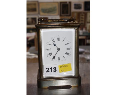 A late 19th c carriage brass clock.14cm high. £40-60