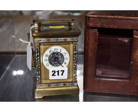 A French early 20th c champleve enamel carriage clock and case.11.5cm high. £120-180