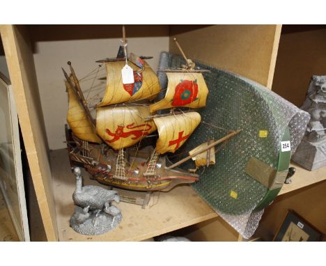 Franklin Mint pewter sculpture , expanding wood book trough, two shooting sticks, model of The Golden Hind and a bagatelle bo