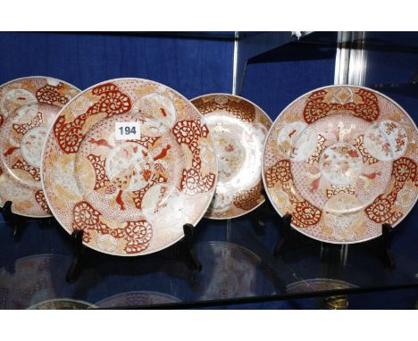 Four Japanese Imari porcelain plates and two matching saucer dishes £60-100