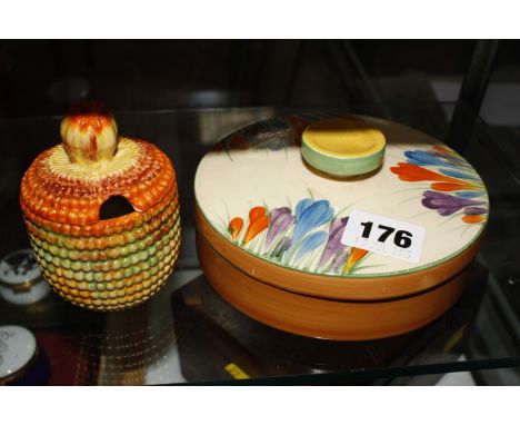 A Clarice Cliff honey pot and cover and a Clarice Cliff crocus dish and cover. £60-80