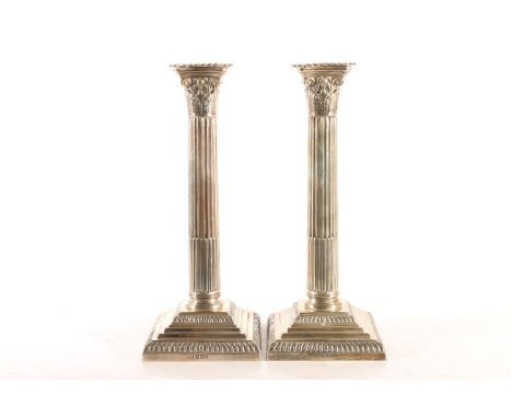 Pair of Victorian silver weighted candlesticks, modelled as Corinthian Columns on stepped bases, Mappin and Webb, Sheffield 1