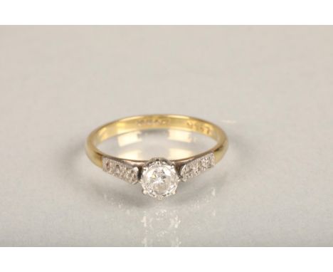 18ct yellow gold and platinum diamond solitaire ring, the diamond approximately 0.25cts flanked by diamond set shoulders, rin