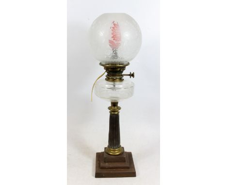 Victorian brass and metal oil lamp, of tapering fluted column form on stepped base, clear glass slice cut reservoir with late