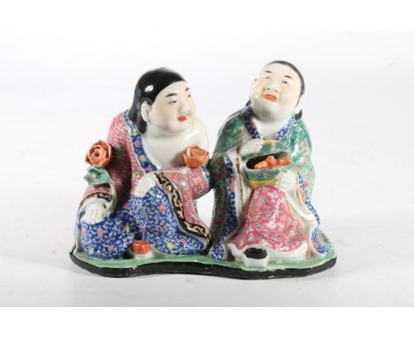 Chinese Famille Rose porcelain figural group of He-he Erxian twins, mid 20thC, holding small animal in box, with impressed se