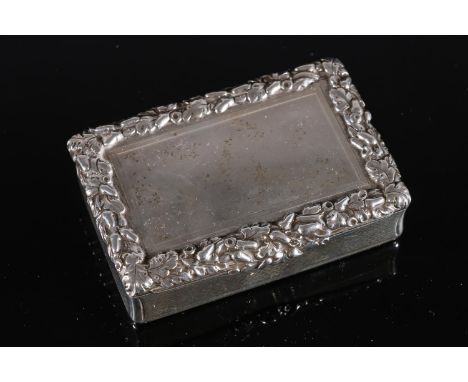 Victorian antique parcel gilt silver table snuff box of rectangular form with relief floral border and engine turned decorati