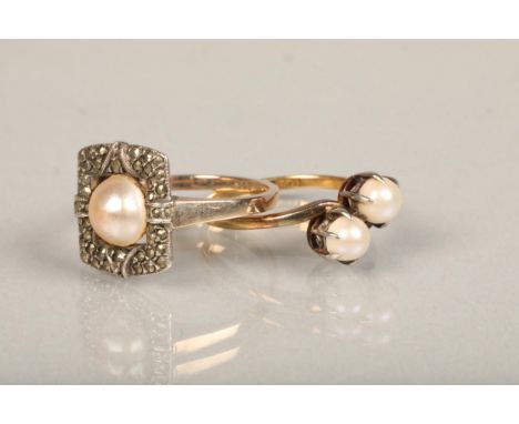 18ct gold seed pearl crossover ring, ring size N, 2.9g and a 9ct gold pearl and marcasite dress ring, size P, 5.1g. (2) 