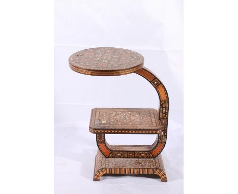 Anglo-Indian Art Deco occasional table, c1920s, the two tier table heavily inlaid with specimen woods, mother of pearl and bo