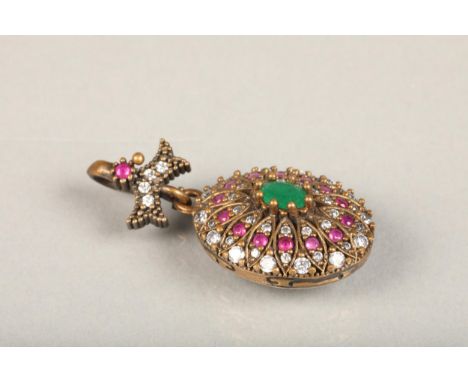 Indian emerald, ruby and white stone oval cluster pendant, the central oval emerald surrounded with halos of white stones and