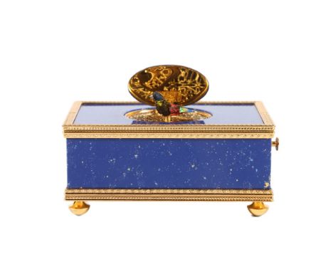 Swiss Reuge Music gilt metal mounted lapis lazuli blue speckled enamel mechanical singing bird box, in original case. The cas