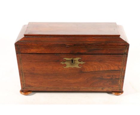 Victorian rosewood tea caddy, of sarcophagus shape with brass inlay beading, recessed handles on four flattened bun feet, W31