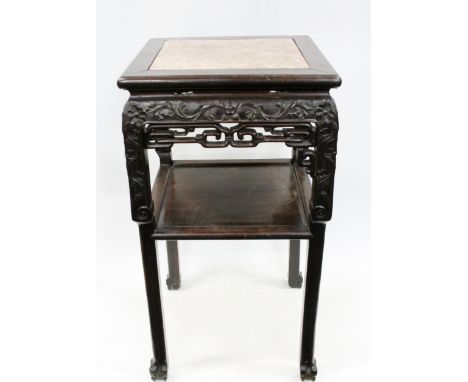 Chinese hardwood jardiniere plant stand, late Qing period, the square inset variegated marble top over pierced fretwork apron