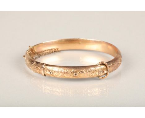 Victorian 9ct gold bangle of buckle and strap form, makers mark rubbed, Birmingham 1898, 10g. 