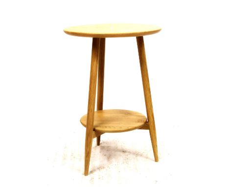 Ercol Teramo occasional table, the round tabletop on tapered supports with circular under tier, H60cm. 