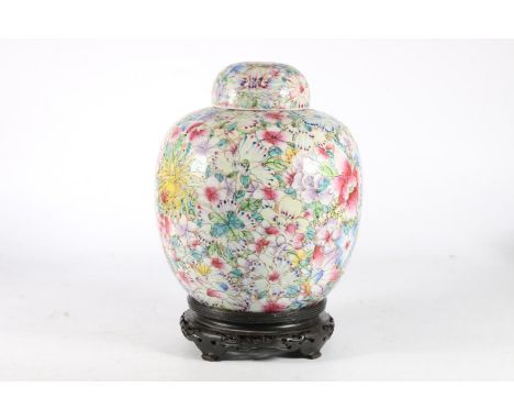 Chinese porcelain 'Millifleur' ovoid ginger jar, Republic period, the body and domed lid profusely painted in polychrome enam