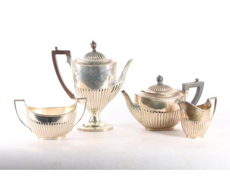 Victorian four-piece silver tea and coffee service, of half fluted tapering form with ebony finials and angular handles, Walt