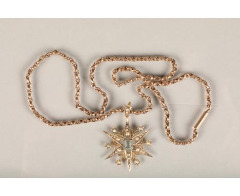Edwardian seed pearl and clear stone pendant, the central square cut aquamarine and split pearls set on star shaped open work