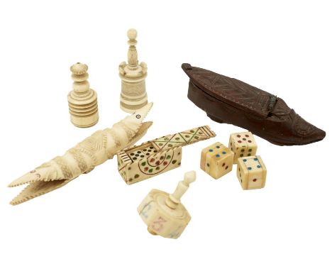 A COLLECTION OF EARLY 19TH CENTURY GAMES AND TRINKETS, probably Napoleonic prisoner of war made, comprising a carved wooden s