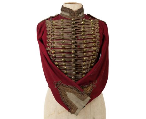 THREE CONTINENTAL HUSSAR STYLE JACKETS. The first red with gold lace decoration and plain ball buttons, the second light blue