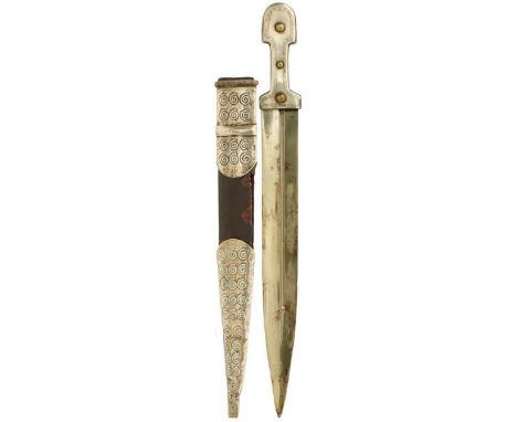 A 19TH CENTURY KINDJAL, 34.5cm fullered blade incised with a maker's mark, characteristic white metal mounted hilt, contained