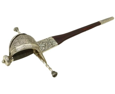 A GOOD LATE 19TH CENTURY COPY OF A SPANISH LEFT HAND DAGGER, 49cm blade with pierced and facteted sword breaking forte, chara