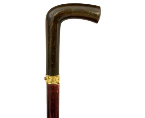 AN EARLY 20TH CENTURY CONTINENTAL SWORD STICK, 70cm tapering diamond section blade, horn L-shaped handle, yellow metal collar