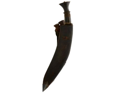 A 19TH CENTURY INDIAN OR NEPALESE KUKRI, 29.5cm double fullered blade, characteristic carved horn hilt, contained in its leat