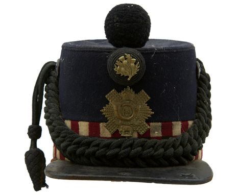 THE HIGHLAND LIGHT INFANTRY OTHER RANKS SHAKO 1869 PATTERN. A good quality example dated 1912, the dark blue cloth covered bo