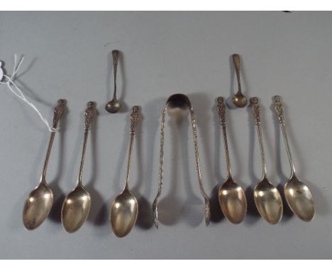 A Set of Six Silver Apostle Tea Spoons, Two Silver Salt Spoons and A Silver Sugar Bow.